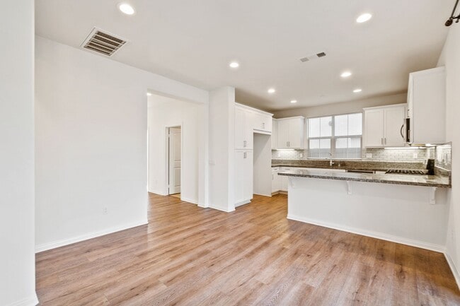 Building Photo - Beautiful newly built 4 bedroom, 3 bath home in the quiet, gated community of Westgate!