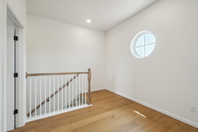 Building Photo - Classic Cape Cod Meets Modern Glam: Your D...