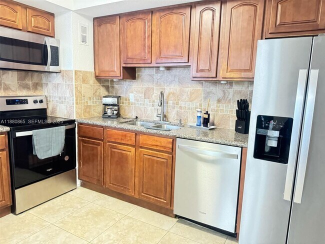 Building Photo - 5838 Collins Ave