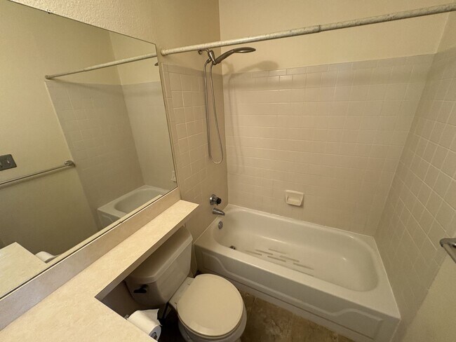 Building Photo - East side condo with community pool/spa/assigned covered parking place