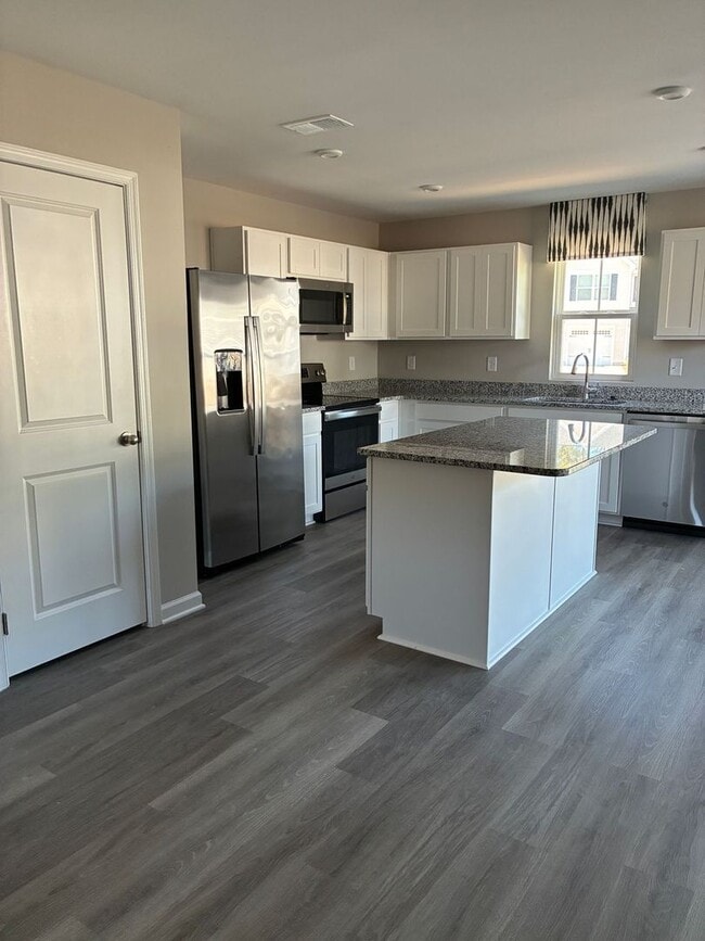 Building Photo - FORMER MODEL townhome at Villa Grande community