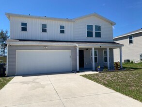 Building Photo - Four Bedroom / Three Bath Home