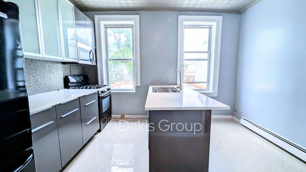 Building Photo - 12-15 31st Drive, 2