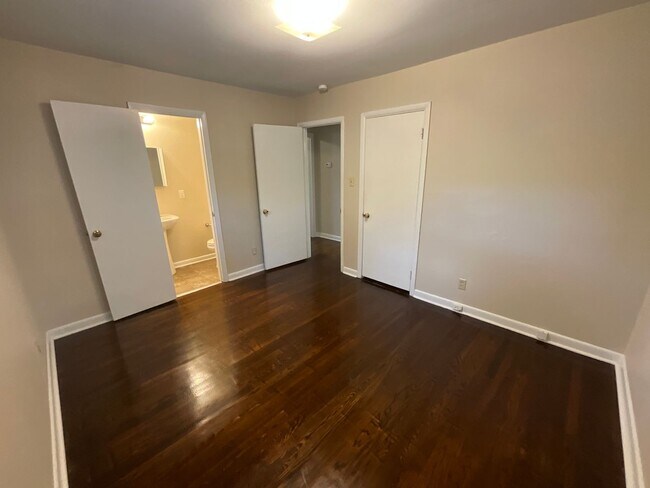Building Photo - Reduced to $1550/mo! N Central Greensboro location, 3/2 brick home with lots of shade, fresh paint!