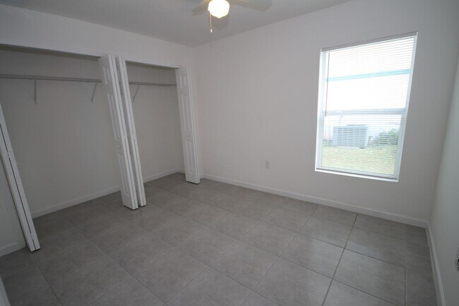 Building Photo - Stunning 4BR/2BA Palm Bay Retreat with Modern Upgrades & Oversized Lot!!