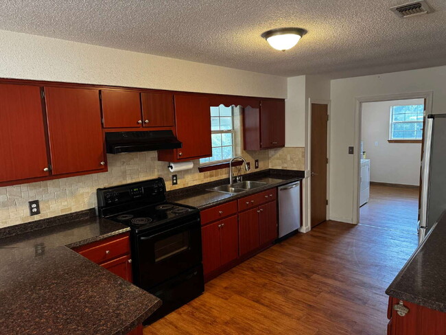 Building Photo - "Charming 3-Bedroom/2 Baths in Navarre - S...