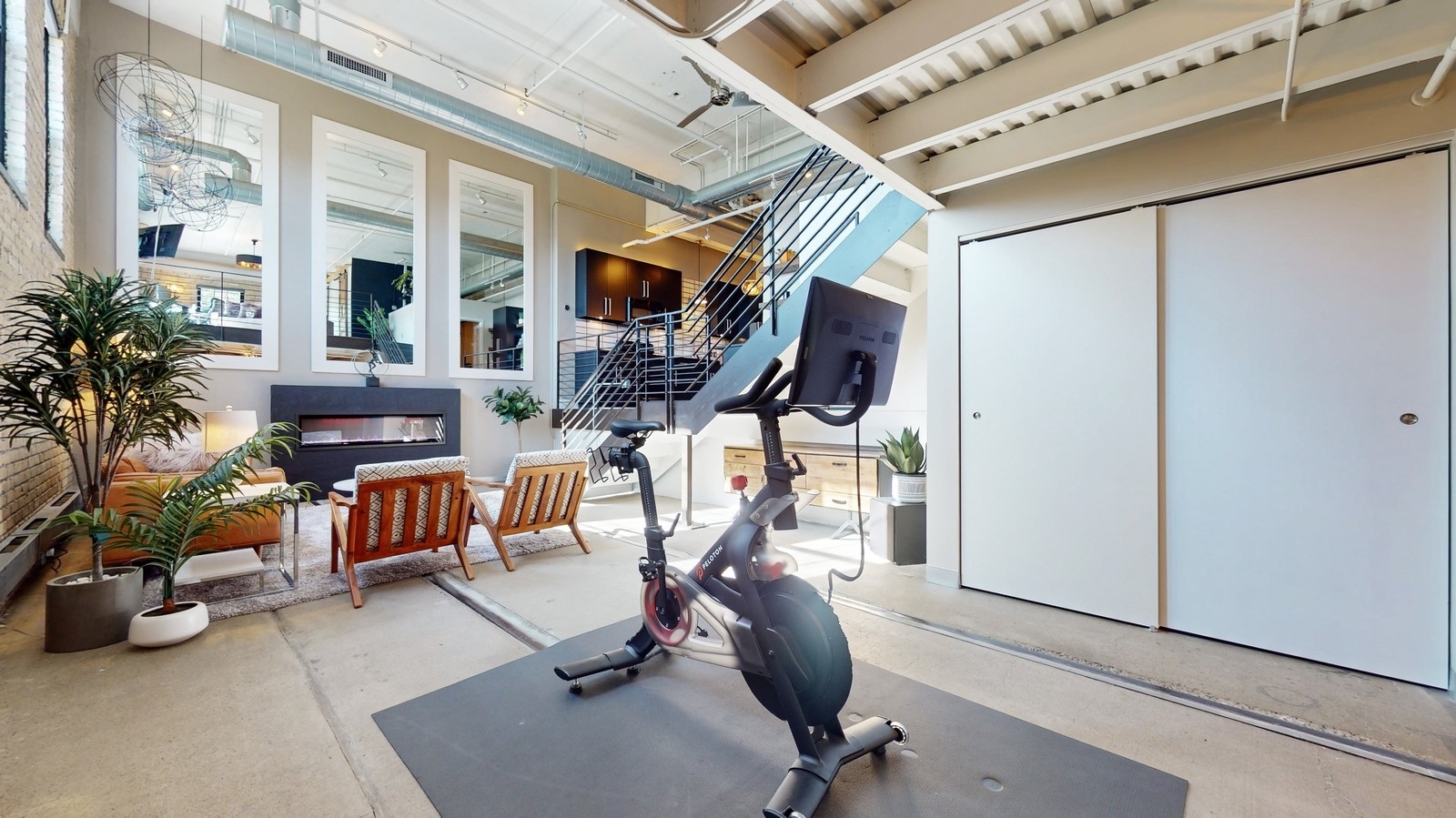 Exercise area with Peloton bike included for use (minus subscription) - 730 Stinson Blvd