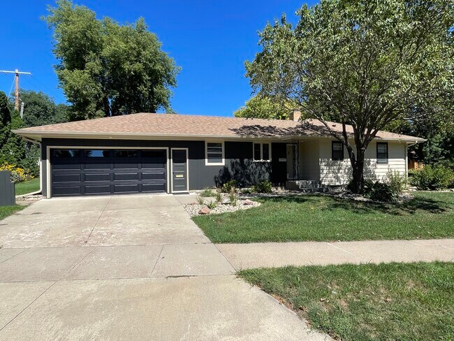 Front with new garage door - 1208 E 30th St