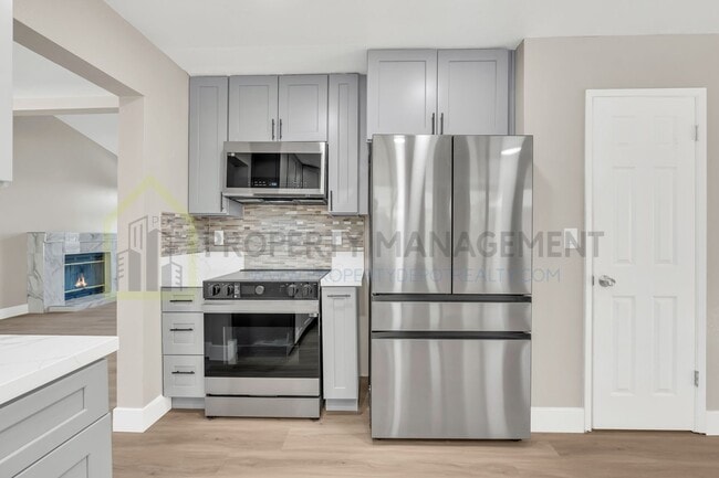 Building Photo - Completely Renovated 4-Bedroom Home with M...