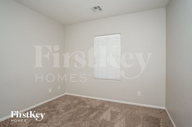 Building Photo - 10387 Howling Coyote Ave