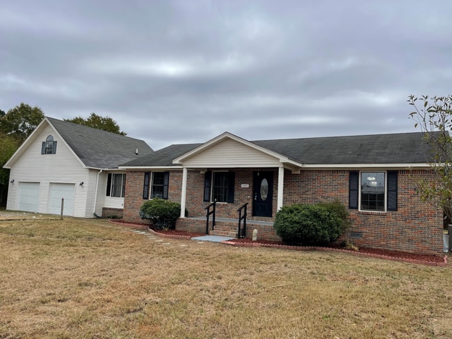 Primary Photo - Spacious 4-Bedroom Home with Bonus Suite i...