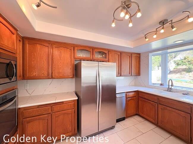 Building Photo - Welcome to this stunning 4-bedroom, 3-bathroom home located in the desirable La Costa neighborhoo...