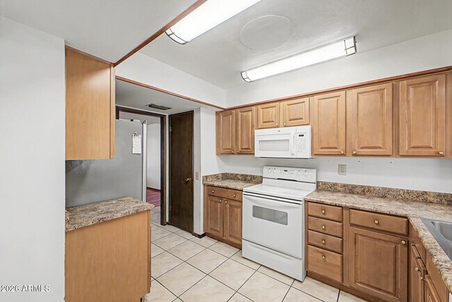 Building Photo - 9847 W Wrangler Dr