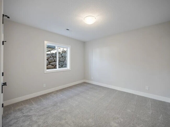 Building Photo - Spacious 4-Bedroom Home in Quiet Polk City...