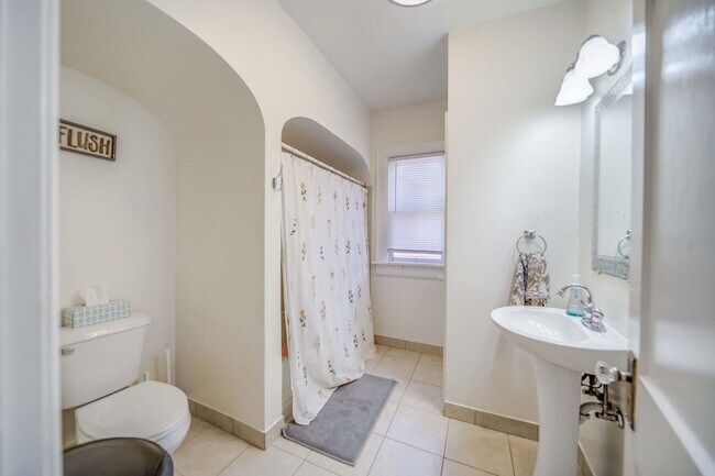 Building Photo - Charming 5-Bedroom Home with Exposed Brick and Modern Upgrades