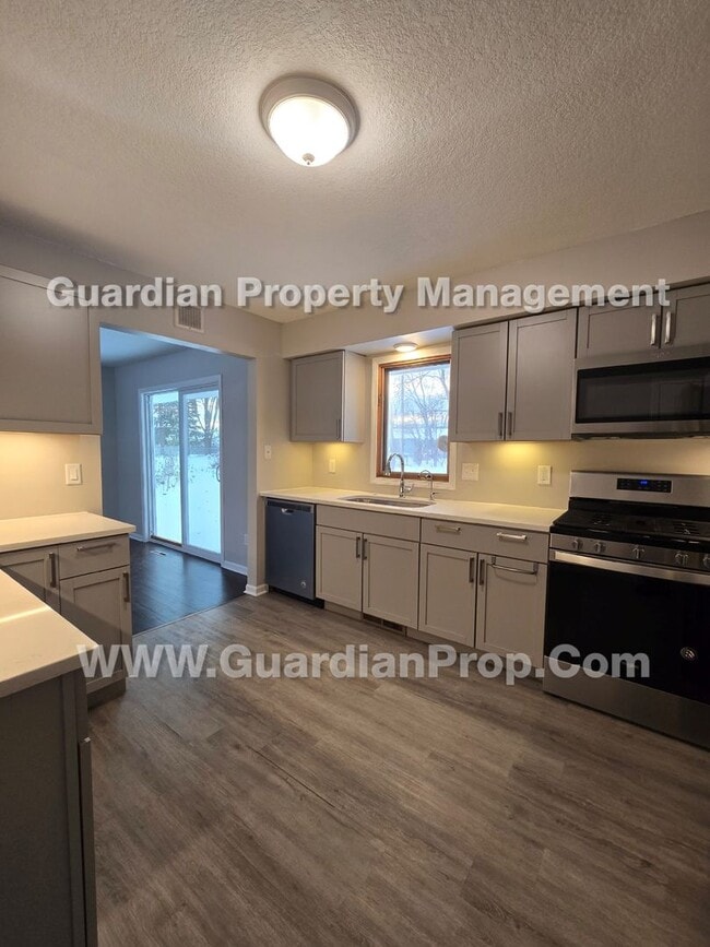 Building Photo - Available now! House with LVP flooring, Walk Out Patio, fenced yard, 2 car attached garage