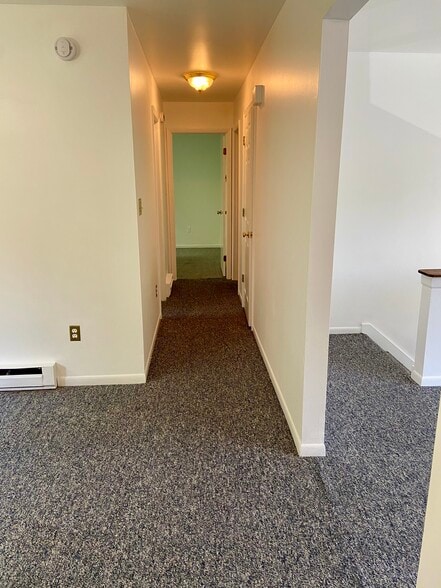 Hallway to bathroom, bedrooms, and laundry - 2710 S 2nd St