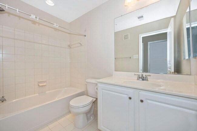 Building Photo - Desirable Two Level Condo For Lease - Not Pet Friendly