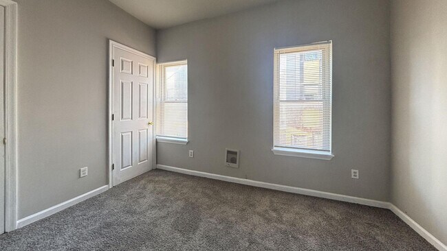 Building Photo - Move-In Ready 3-Bedroom Home with Stylish Hardwood-Style Flooring