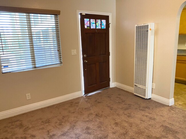 Building Photo - AFFORDABLE 1st Floor Condo & patio yard!