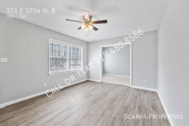 Building Photo - 321 E 57th Pl N