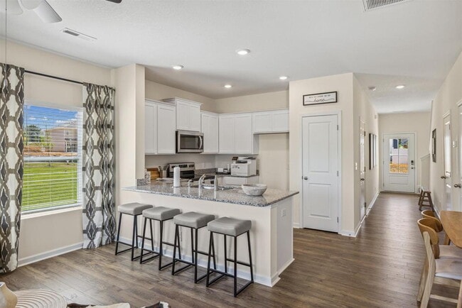 Building Photo - End unit! Available Early June!