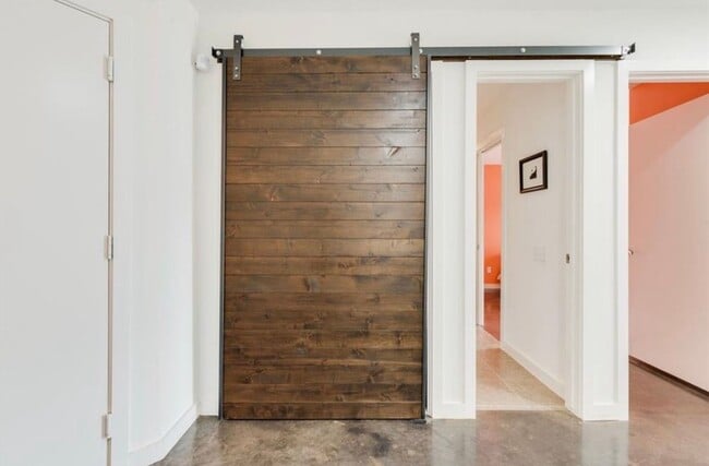 Building Photo - Modern Loft w/ Rooftop Deck & Downtown Vie...