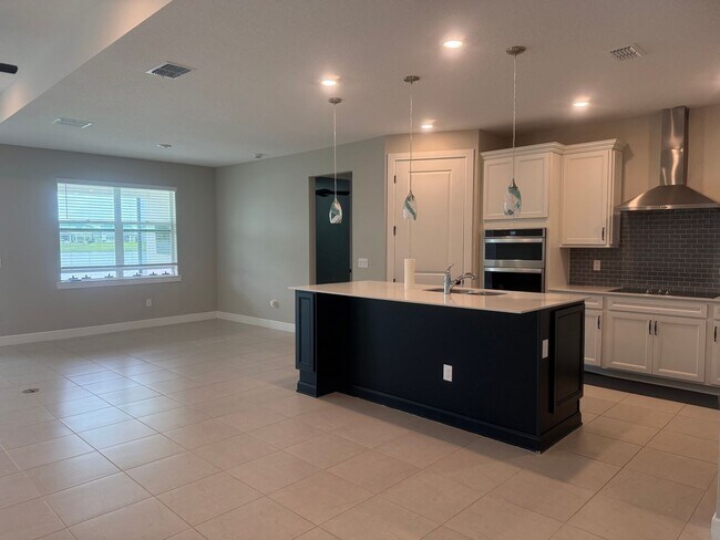 Building Photo - Lakeview Living with Bonus Flex Space & Resort-Style Amenities