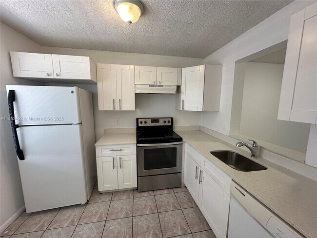 Building Photo - 8540 N Sherman Cir