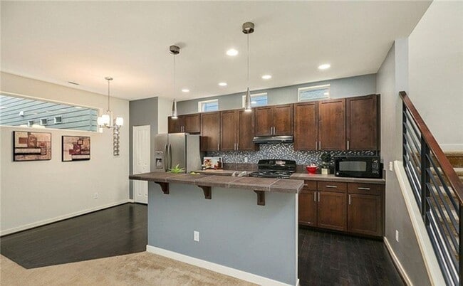 Building Photo - A Modern In-city Style with Comfort of the Suburbs Single Family Detached Condo