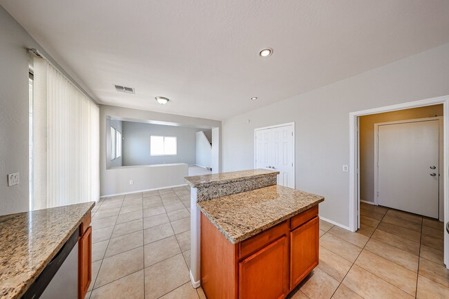 Building Photo - Welcome to this spacious 4 bedroom, 2.5 ba...