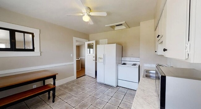 Building Photo - Charming four-bedroom home one block from UNR