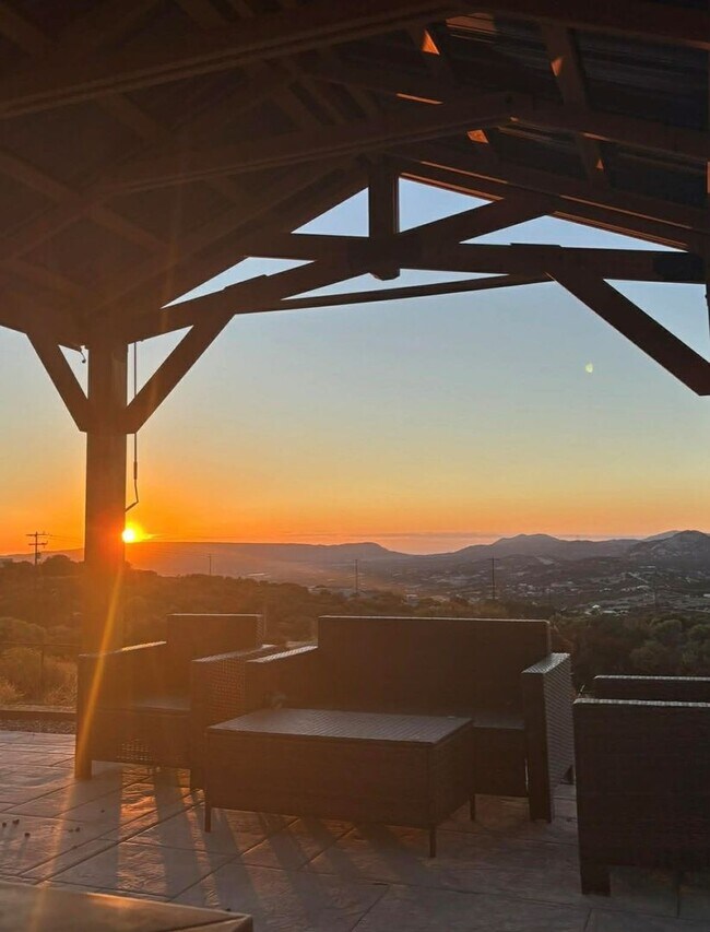 Building Photo - 4BR/2BA HOME w/ attached garage, usable land, fenced in back yard in CAMPO available!