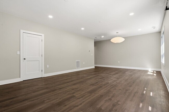 Building Photo - Move-In Ready 4BR Home | Deck, Patio & Open Concept Living