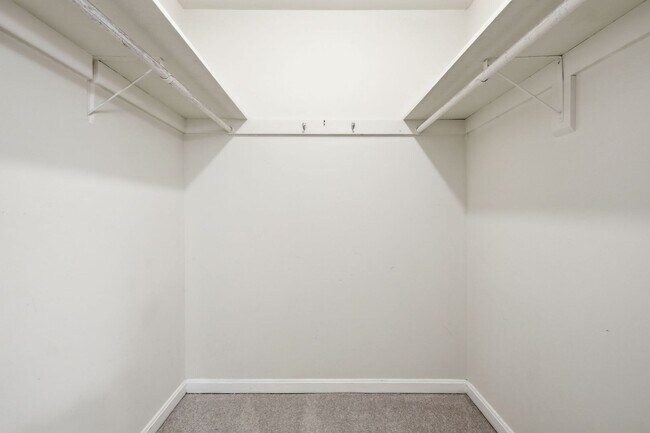Building Photo - Contemporary design meets exceptional space in this inviting ground level residence, offering eff...