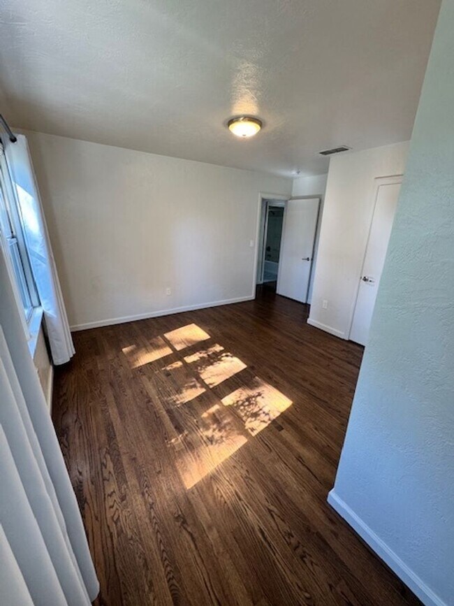 Building Photo - Charming Updated 4-Bedroom Home in the Garden Tract – Hardwood Floors, Central Air, 2-Car Garage ...