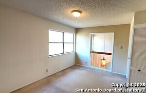 Building Photo - 6042 Spring Time St