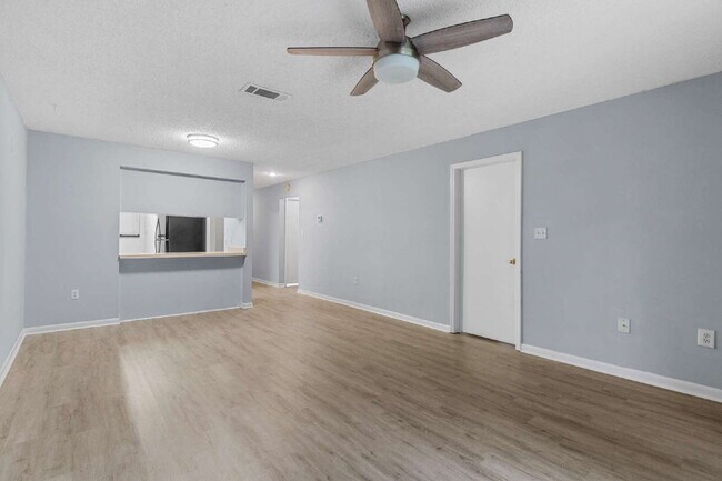 Building Photo - Freshly Updated 2BR Condo with Private Balcony, Community Pool, & In-Unit Laundry
