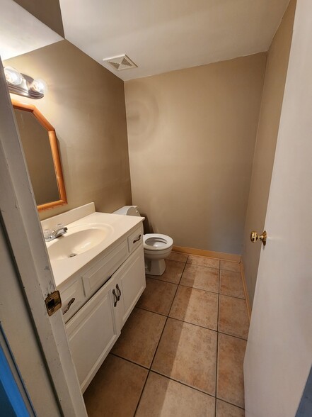 Downstairs Bathroom - 8902 Haskins St