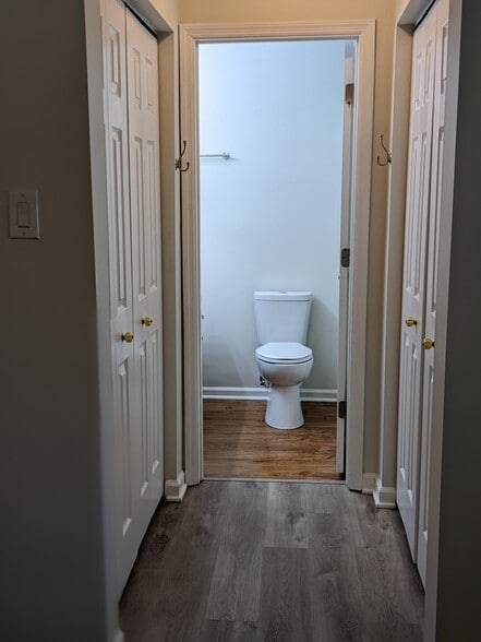 Small hallway from Main Bedroom is flanked by two closets and leads to en suite. - 1649 Summerhill Dr