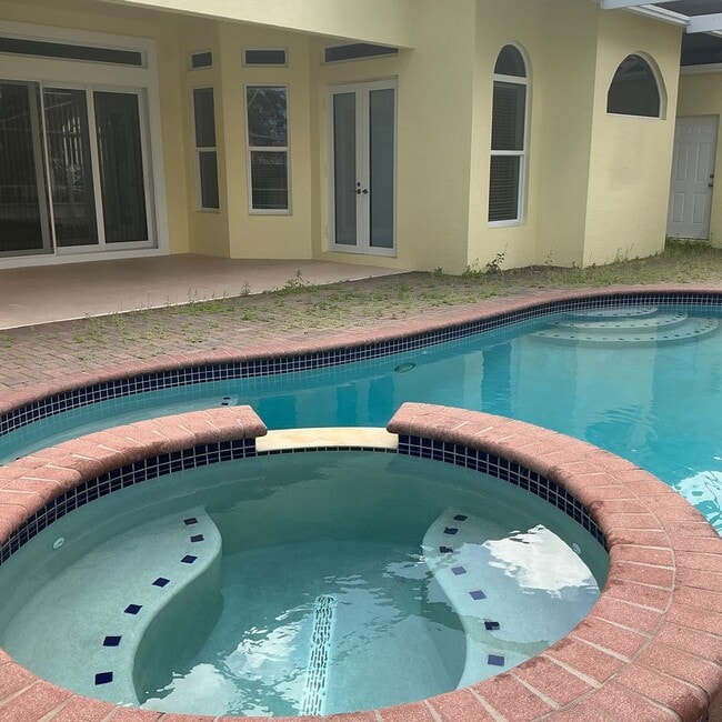 Building Photo - Pool home 4/3/2  Located East of US One  for Rent