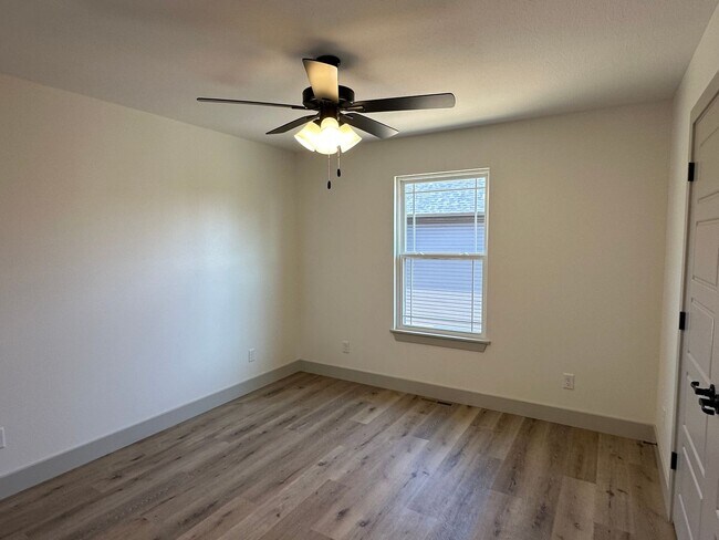 Building Photo - NEW 5 Bed 3 Bath w/ Walk Out Basement Waynesville School District