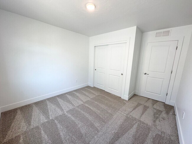 Building Photo - Spacious Luxury Townhome Designed for Modern Living available soon!