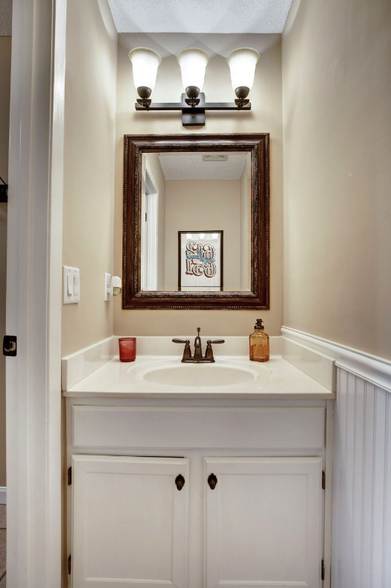 Downstairs half bath. - 9259 Troon Court