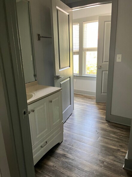 Each bedroom has an attached bathroom. - 202 Dixie Ave