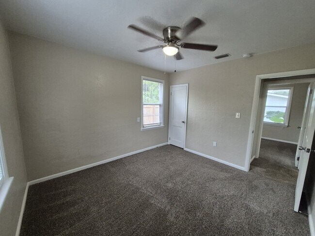 Building Photo - Spacious 4-Bedroom Home with Detached Gara...