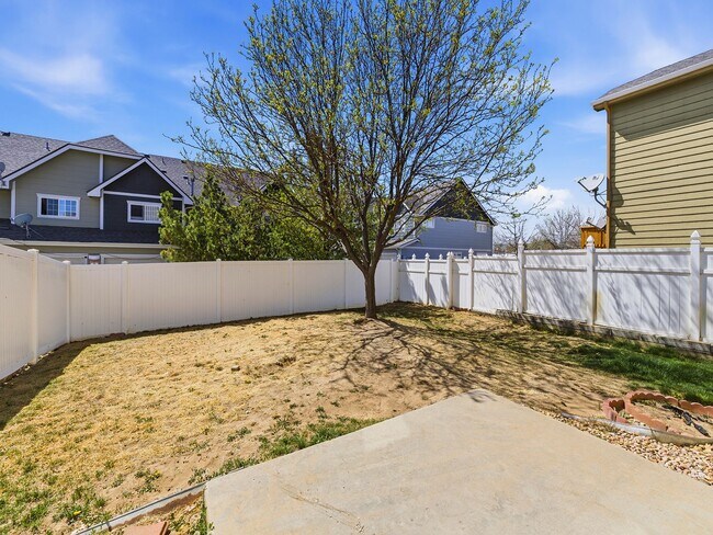 Building Photo - Recently Refreshed 3 Bed, 2.5 Bath Duplex with Fenced Yard — Available Now in Evans, CO!