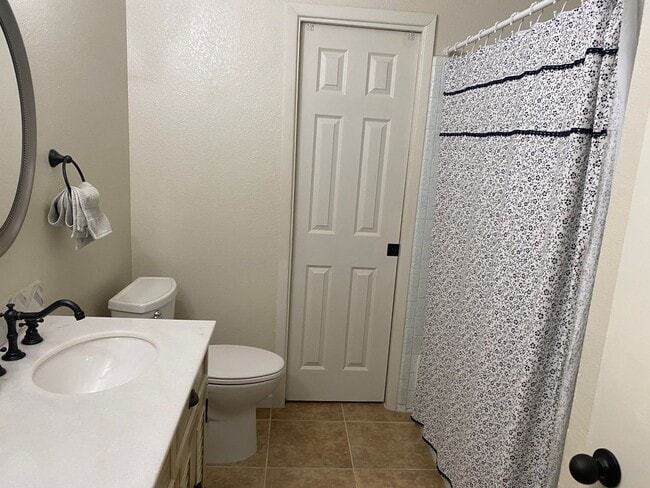 Building Photo - 3 bedroom home with large living room on a large corner lot with lots of room for play.