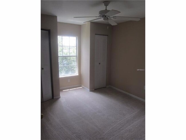 Building Photo - Water view condo with garage in sought after westchase