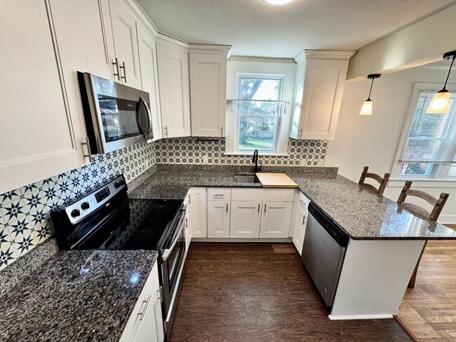 Building Photo - Ready NOW! A Ranch Home, All Appliances Convey, Pet Friendly, Includes Workshop!